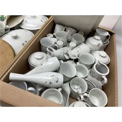 Large quantity of Porcelana Real Brasil White Blossom pattern tea and dinner wares, to include dinner plates, tea cups and saucers, salt and pepper pots, tureens, pie dishes coffee pots, place mats, spoons and glasses, etc, in five boxes 