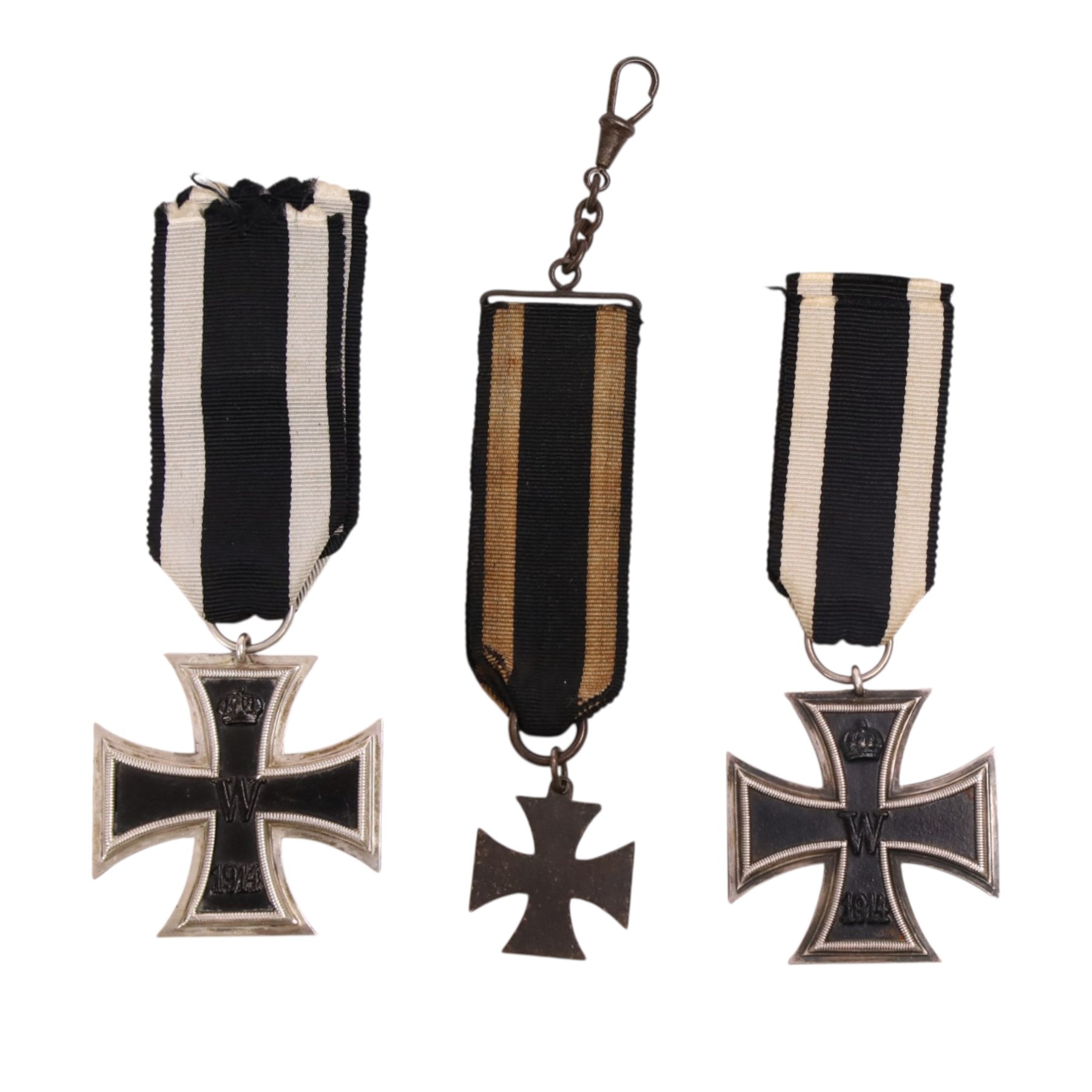 WWI German two Iron Crosses 1st class, together with a Iron Cross watch fob 