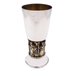 Modern limited edition silver goblet to commemorative the ninth centenary of Winchester Cathedral, designed by Hector Miller for Aurum, the tapering cylindrical bowl with gilt interior upon a gilt stem modelled as figures, and spreading circular foot, hallmarked Hector Miller, London 1979, number 334/900, H16.5cm, 13.09 ozt (407 grams)