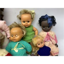 Twelve mid-20th century vinyl and plastic dolls marked Camay, Prince Charming, Palitoy etc; predominantly wearing hand-knitted clothing (12)