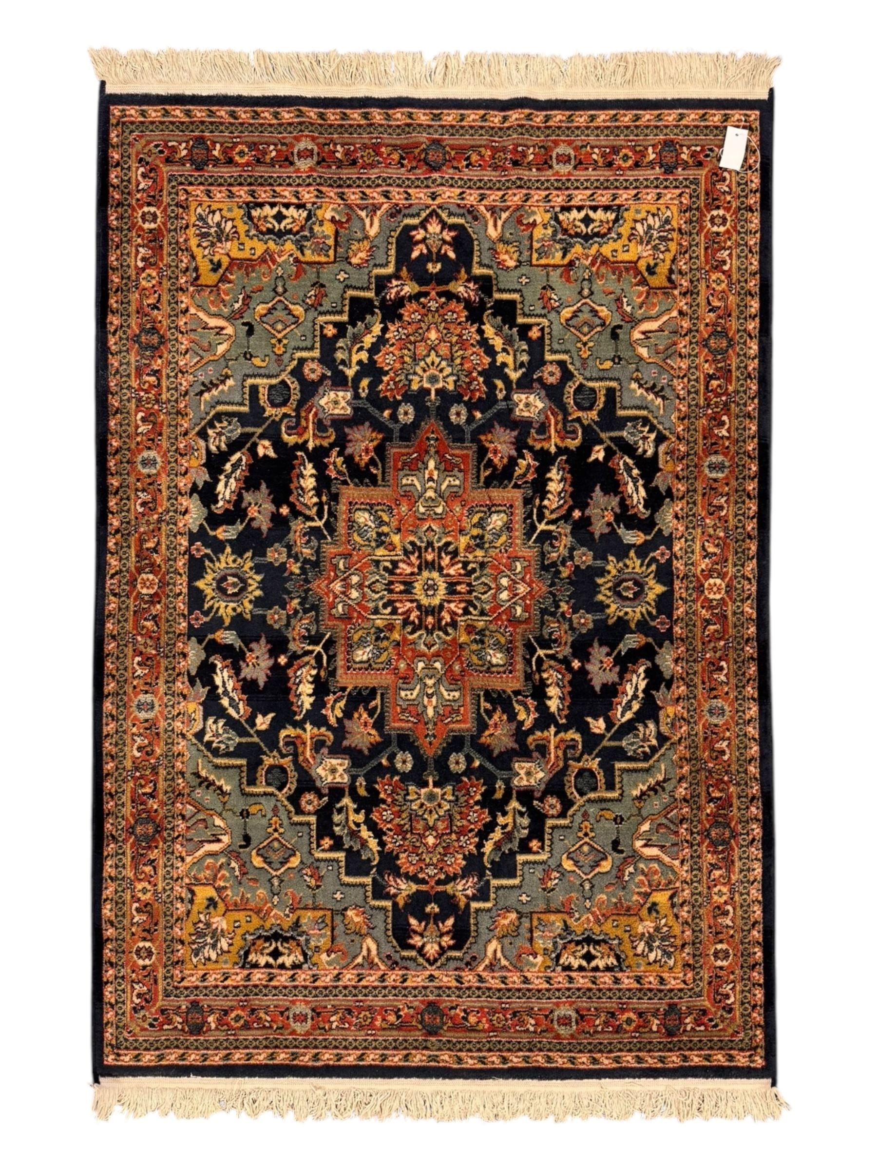 Belgian Sultan woollen ground rug, central navy field densely decorated with floral sprays and geometric patterns (192cm x 135cm); handwoven tribal terracotta ground rug (121cm x 71cm); Persian crimson ground runner, all over stylised floral and foliate motifs (266cm x 94cm)