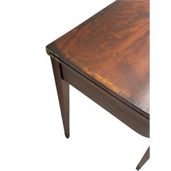 Early 19th century figured mahogany side or tea table, the fold-over top with rosewood band, frieze fitted with single drawer, on square tapering supports with boxwood stringing