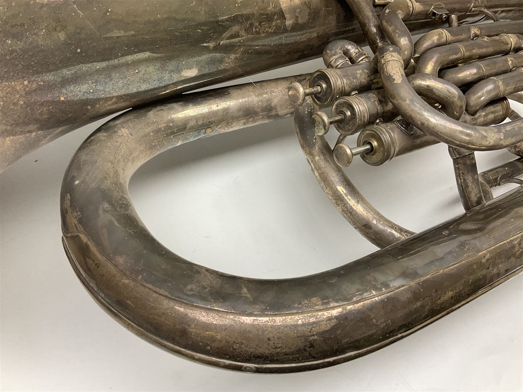 Boosey & Co silver plated 'Solbron' Class A Tuba c1920, serial number 102760, with compensating pistons and foliate engraved decoration H106cm 