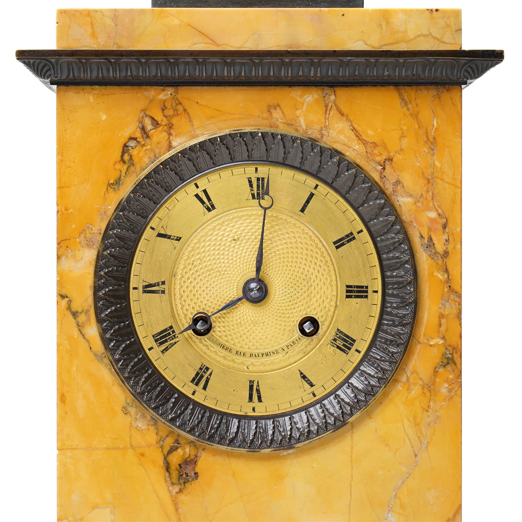 French-First quarter 19th century 8-day sienna marble and bronze-mounted mantel clock of rectangular architectural form, with patinated foliate guilloche pattern cast bronze mounts  in richly figured sienna marble, surmounted a by a classical patinated bronze bust of Napoleon Bonaparte, above a gilt engine turned dial with Roman numerals and blued steel hands, with a twin train Parisian countwheel striking movement, striking the hours and half-hours on a bell, silk suspension with thumb-screw adjustment. With pendulum.