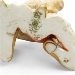 Doulton Burslem 'Mephistopheles and Marguerite' Vellum double-sided figure, the obverse formed as a smiling demon, the reverse formed as a woman with a book and flower, decorated in orange and gilt to one side and in gilt to the other, printed green mark to base, H30cm 