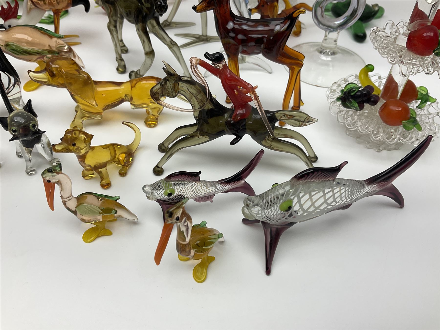 Large collection of hand-blown glass animals and figures, to include fish, birds, cats, dogs, monkeys etc