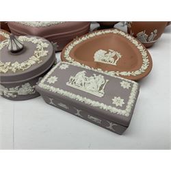 Collection of Wedgwood Jasperware, in orange, lilac and pink colourways, including oval tray, small jug, trinket boxes, trinket dishes, etc , all with impressed mark beneath