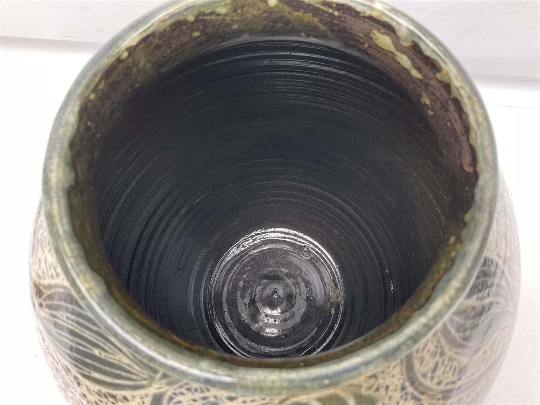 John Egerton (c1945-): studio pottery stoneware vase decorated with fish, mermaids and ammonites, H38cm