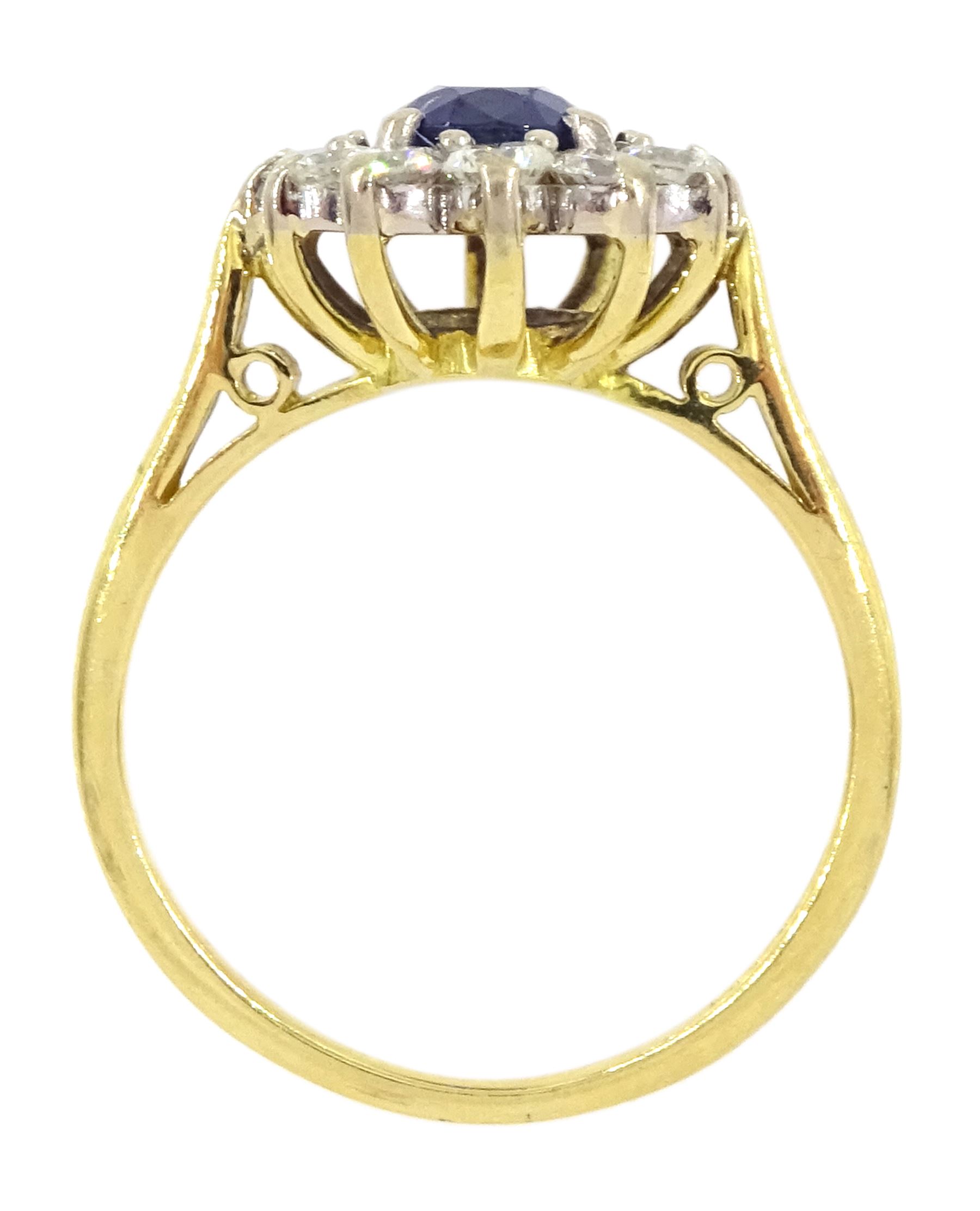 18ct gold oval sapphire and round brilliant cut diamond cluster ring, Birmingham 1994, sapphire approx 1.00 carat, total diamond weight approx 0.70 carat
