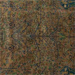 Antique Persian rug, with central tree of life design on a camel field, enclosed by dark blue floral border, with green, blue and ochre detail throughout