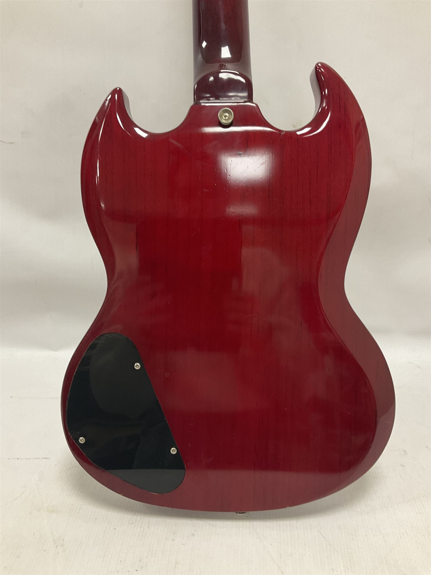 Vintage VS6M Reissued Series six string electric guitar, with solid body in cherry red finish, in carrying case, guitar L103cm