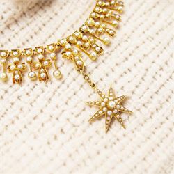 Edwardian 15ct gold split pearl fringe necklace, thirteen graduating cross pendants, each ...