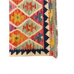 Anatolian Turkish Kilim ivory ground runner rug, decorated with all over multi-colour geometric lozenges with ivory outline