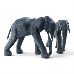 In the style of Liberty & Co - pair of 20th century ebonised leather elephants