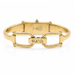 Gucci ladies gilt quartz wristwatch, Ref. 1500, with mother of pearl dial, boxed