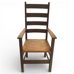 Arts and Crafts oak ladder back armchair in the manner of M H Baillie Scott, the high back with shaped slats and plain uprights, over a solid seat and square arm supports, joined by plain stretchers