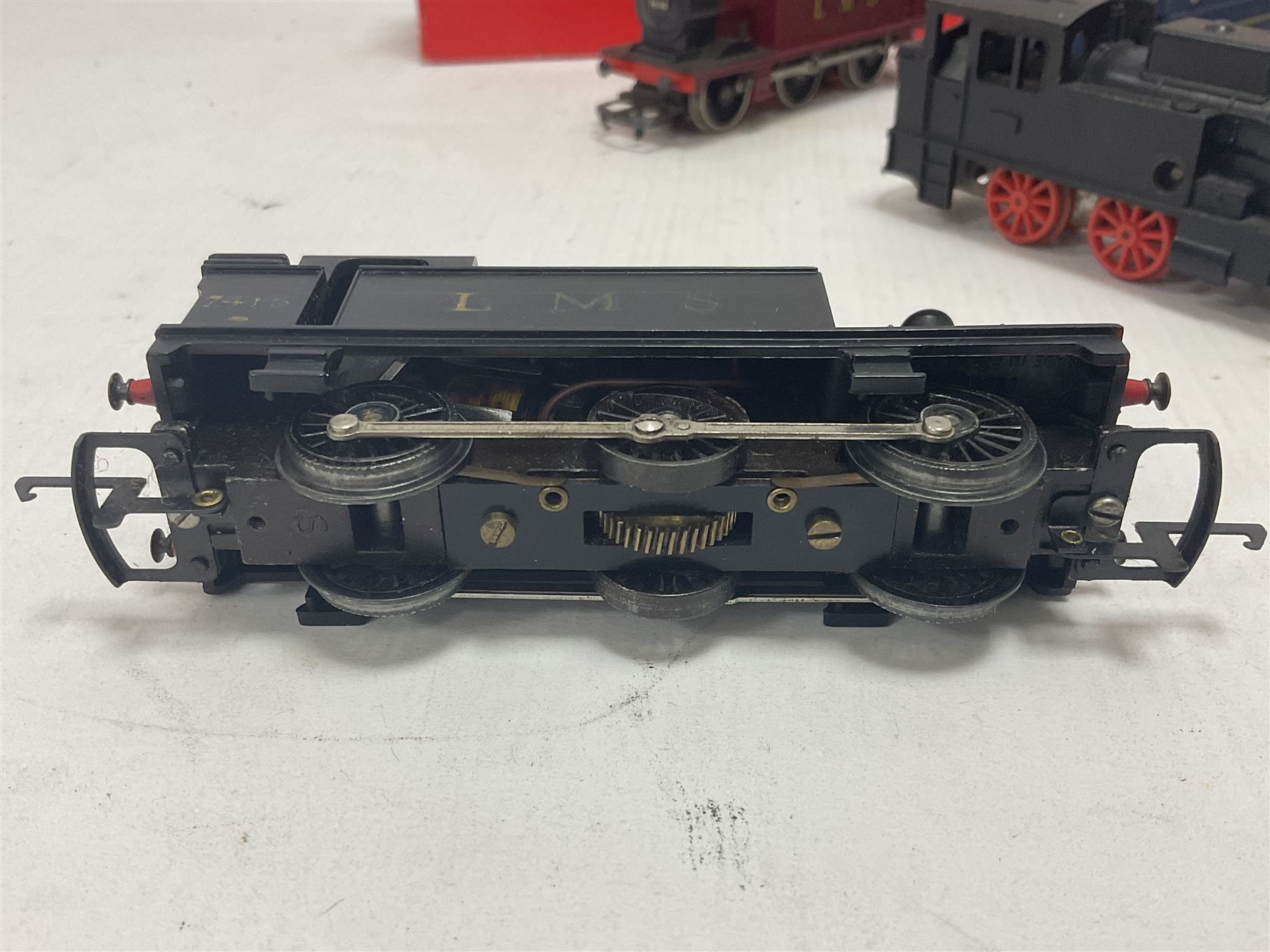 Hornby/Tri-Ang ‘00’ gauge - nine locomotives to include Britannia Class ‘Britannia’ 4-6-2 no.70000 in BR green; Class M7 4-4-0 Tank no.30027 in BR black; Princess Class ‘Princess Victoria’ 4-6-2 no.46205 in BR black; in original boxes; further loose models Princess Class ‘Princess Elizabeth’ 4-6-2 no.46201 in BR green; Class 3F 0-6-0 tank no.7606 in LMS crimson; TR double ended diesel locomotive; three further tank locomotives and one loose tender (10) 