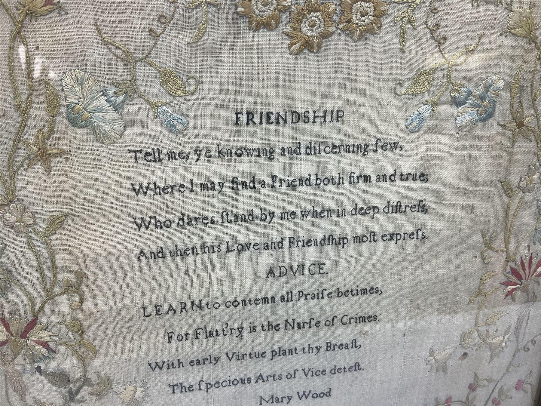 Early 19th century 'Friendship' silk work sampler, worked with poem within naturalistic floral borders, by Mary Wood aged 12, in glazed frame, H46cm W34.5c,
