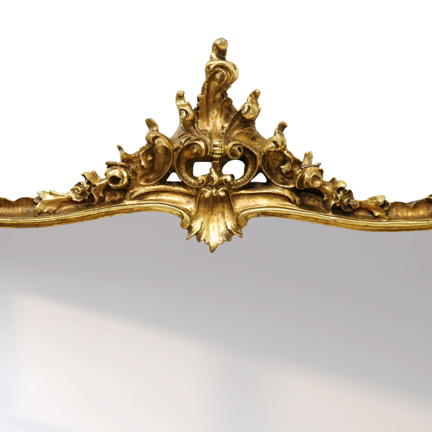 Contemporary Rococo revival style gilt overmantel mirror, shaped rectangular mirror plate with scrolling acanthus and rocaille frame, sides with inset Wedgwood style portrait plaques 