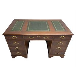 Figured walnut twin pedestal desk, moulded rectangular top with leather inset, fitted with eight drawers, on bracket feet