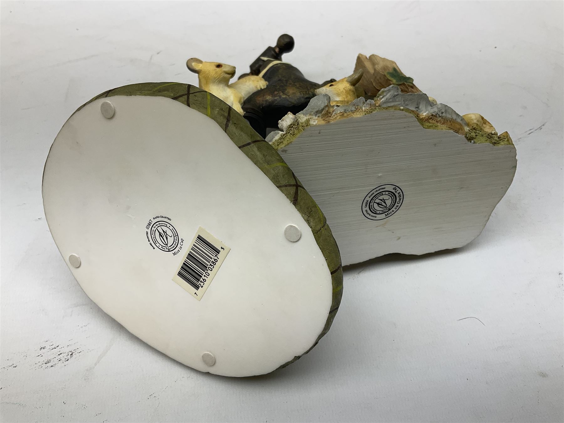 Border Fine Arts, swimming otter, together with three country artists figures, mice on candle stick, mice on garden tap, mice in cap, otter H26cm