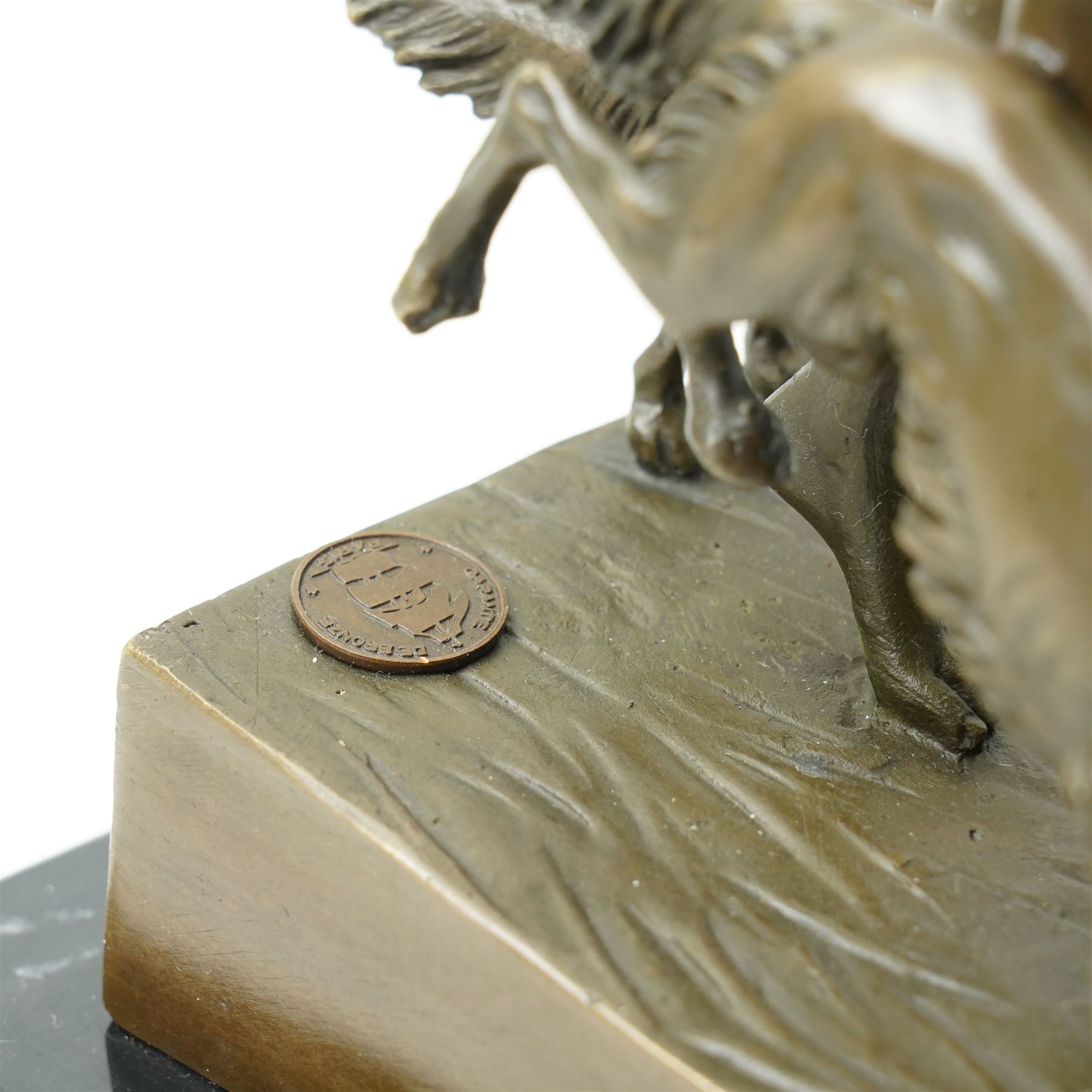 Art Deco style bronze, after Josef Lorenzl, modelled as a nude female figure holding a bow, with two dogs,  raised upon a rectangular base, H33cm