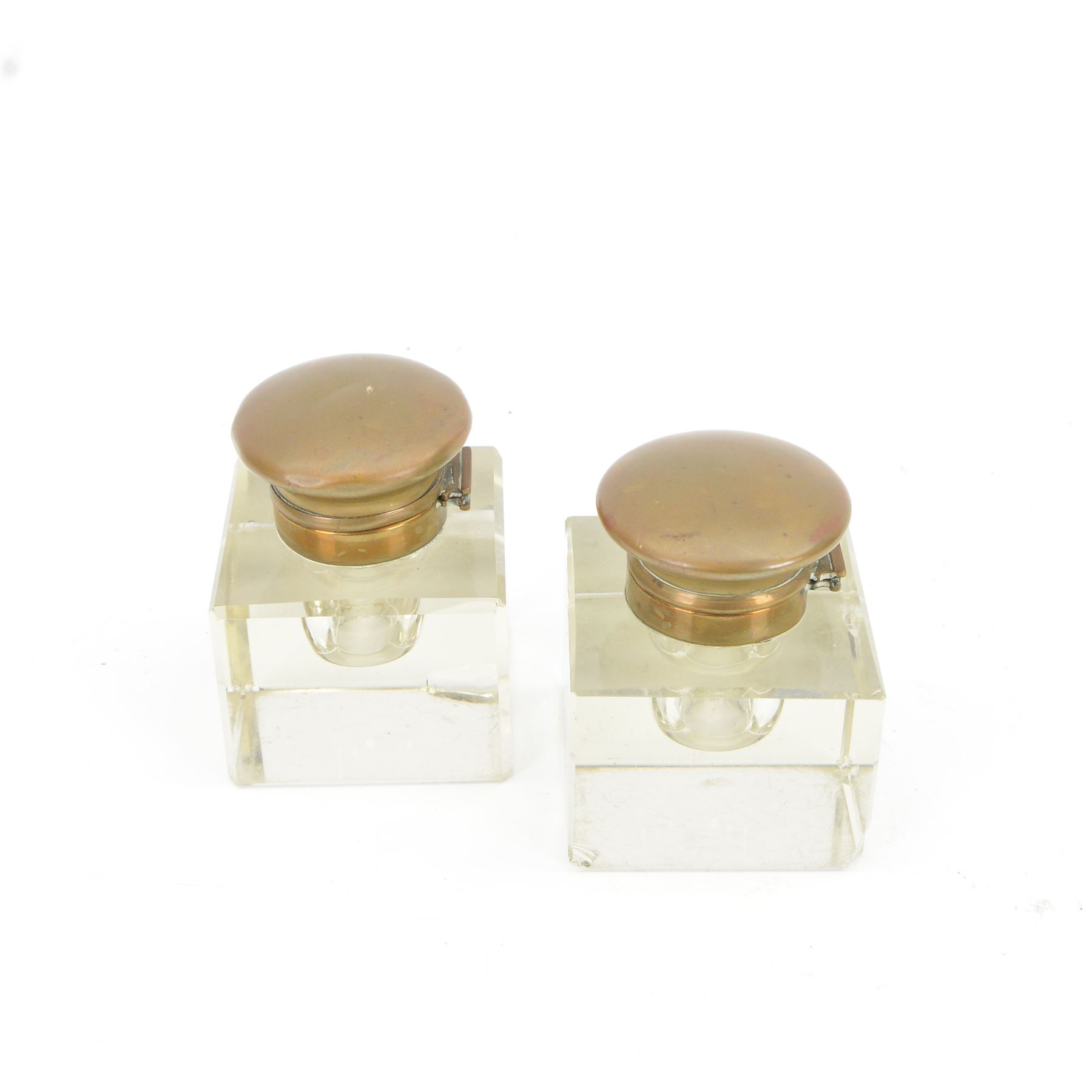Victorian brass metal mounted red marble inkstand, the stepped rectangular base raised upon bun feet, complete with two glass ink bottles with hinged lids, H12cm