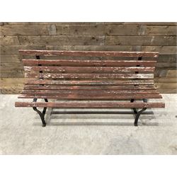Wrought metal and wood slatted garden bench
