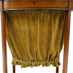 Edwardian inlaid satinwood oval sewing or work table, crossbanded and ebony-strung hinged top enclosing fitted compartment and olive-green upholstered well, raised on square tapering splayed supports united by under-tier 
