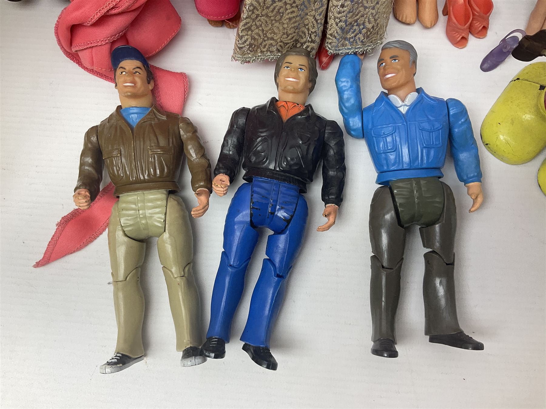 Pelham Puppet - Tyrolean Girl in yellow box; three 'A' Team action figures; clockwork plastic Mickey Mouse figure; and seven various fashion dolls (12)