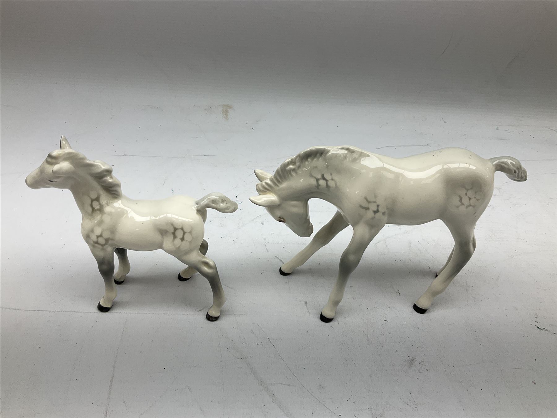 Seven Beswick figures of horses, including Connemara pony in grey no.1641, Arab in bay no.1265, large foal in grey no.947 etc, together with a Goebel figure of a horse (8)