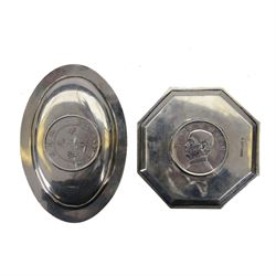 Two Chinese silver dishes both inset with coins, the first an octagonal example with a 'birds over jung' silver dollar, stamped Zee Hung Silver, the second an oval example set with a Chihli silver dollar, stamped Nanking, largest W11cm