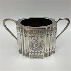 Victorian three-piece silver tea service, comprising teapot, twin handled open sucrier and milk jug, of oval form with shaped rim and C handles, each engraved with crests and bands of strapwork decoration, the milk jug and sucrier with gilt interiors, hallmarked Josiah Williams & Co, Exeter 1881, the teapot with ivory insulators and finial, all contained with a tooled leather, blue silk and velvet lined fitted case, retailed by West & Sun, Dublin 
This item has been registered for sale under Section 10 of the APHA Ivory Act