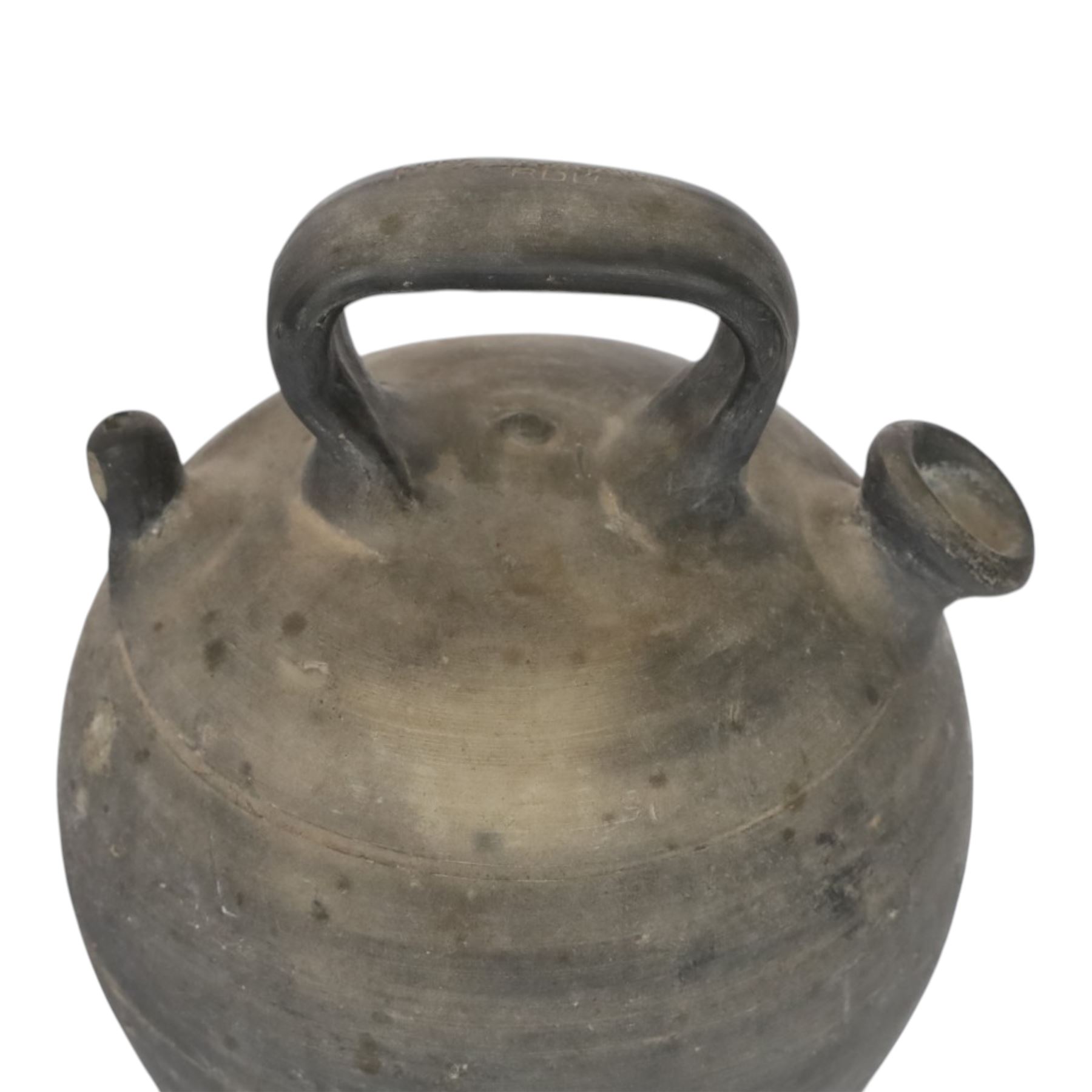 Four 20th century Spanish blackened earthenware botijo or cruche vessels, each of typical baluster form with central loop handle and opposing spout, impressed marks to handles, tallest example H31cm