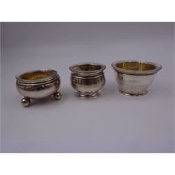 Pair of early 20th century Austro Hungarian silver open salts, of circular form with beaded rims, marked for 800 Standard, Prague, with makers mark HG, D5.5cm, together with a smaller pair of Czechoslovakian silver open salts, marked for 800 standard, with makers mark FB, a further set of six open salts, probably German, each of circular form upon three ball feet, marked 800, each with glass liner, and a German silver sifting spoon, marked with crown and crescent and marked 800, approximate total silver weight 9.49 ozt (295.3 grams)