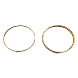  Two gold bangles, stamped 10K, approx 7.6gm  