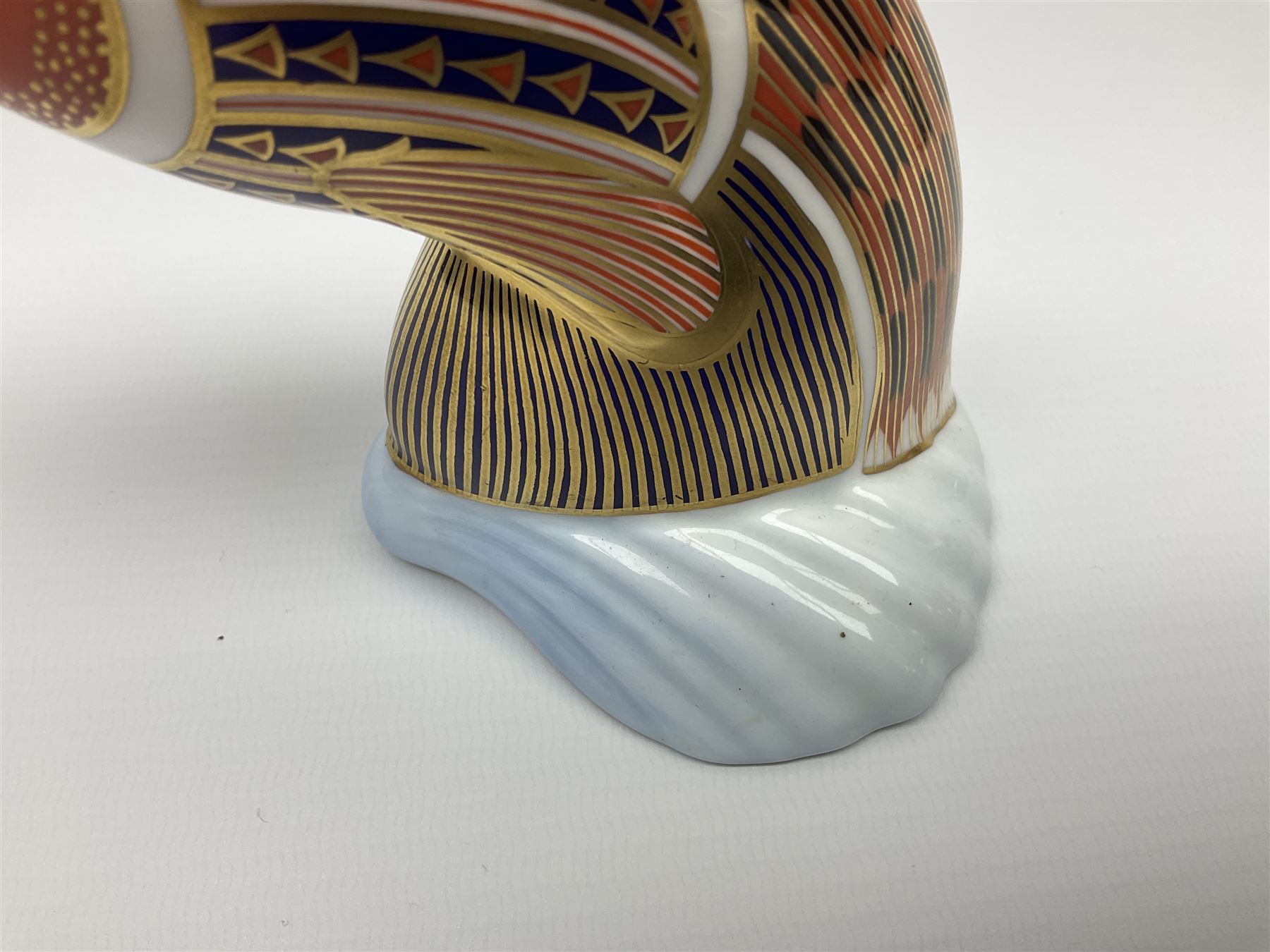 Royal Crown Derby tropical fish paperweight in the form of a Guppy, with a silver stopper, and Royal Crown Derby tortoise paperweight with gold stopper