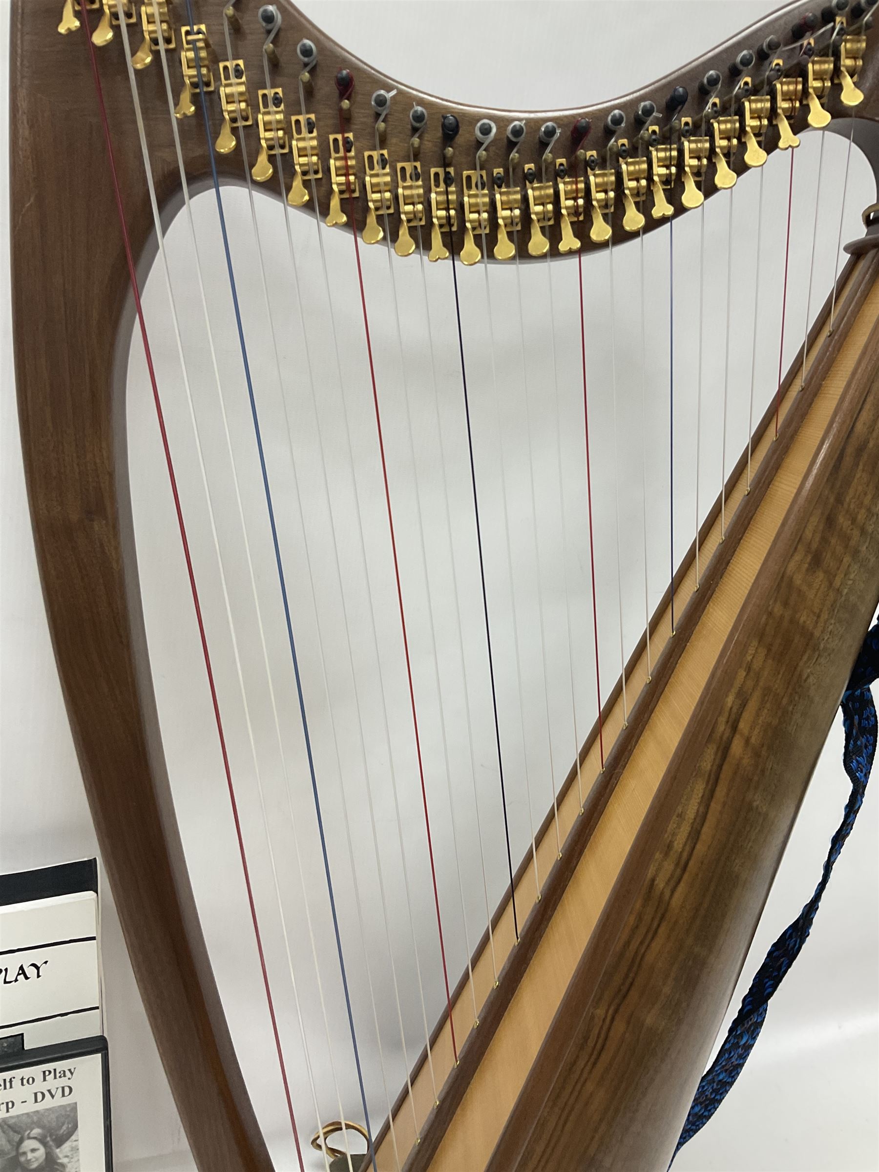 Contemporary 24 string Celtic or Irish Folk Harp with an Ash soundboard and 24 sharpening keys, with three music books, tutorial and DVD In a soft carrying case with tuning key 
