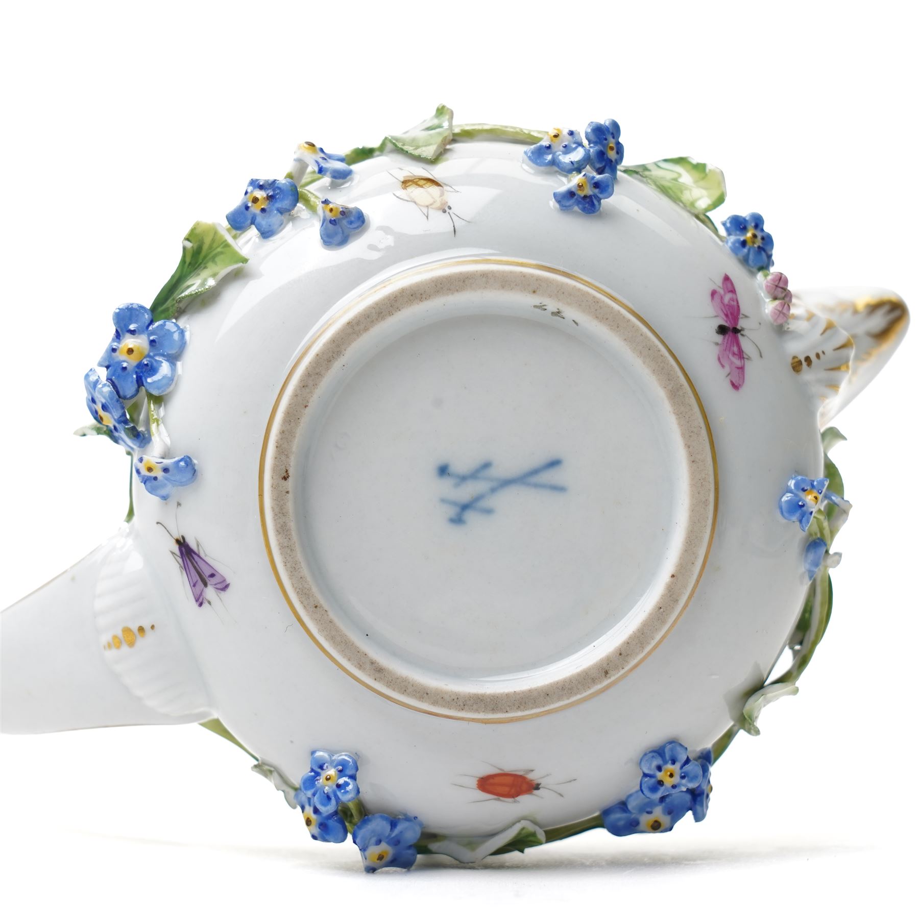 Early 19th century Meissen covered milk jug, of squat ovoid form with elongated handle, the body with encrusted forget-me-not floral decoration and leaves, with painted insects, underglaze blue crossed swords mark to base, W15cm