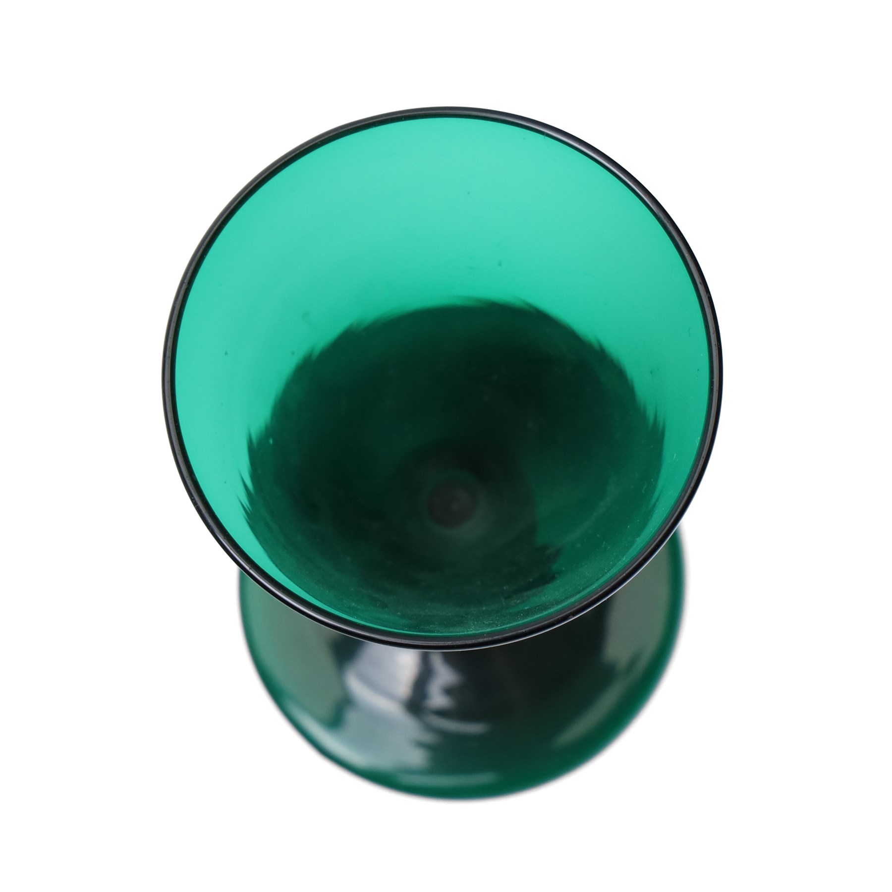 Five green wine glasses of early 19th century design with conical bowls and double knop stems on a circular foot, with pontil marks, pair of green wine glasses with chamfered stems together with an Asprey catalogue of green glass 1740-1840 and two pieces of glass fruit and leaves