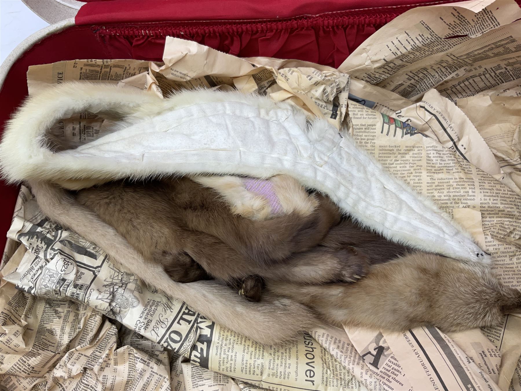 Scout uniform and scout books, together with a vintage suitcase, and mink stoles 