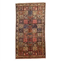Central Persian Bakhtiari Kheshti design hand-knotted rug, field composed of a grid of squ...
