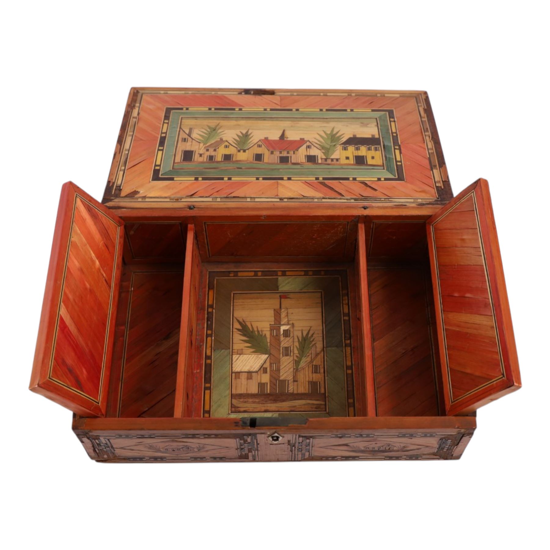 Napoleonic prisoner of war straw work box, the exterior with panels of buildings in geometric borders, the interior of the hinged lid opening to reveal two compartments with hinged covers decorated with flowers, H8cm, D16cm