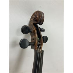 Copy of a full size Stradivarius violin, with an ebonised fretboard, tailpiece and tuning pegs, with a polished chin rest  Length 60cm