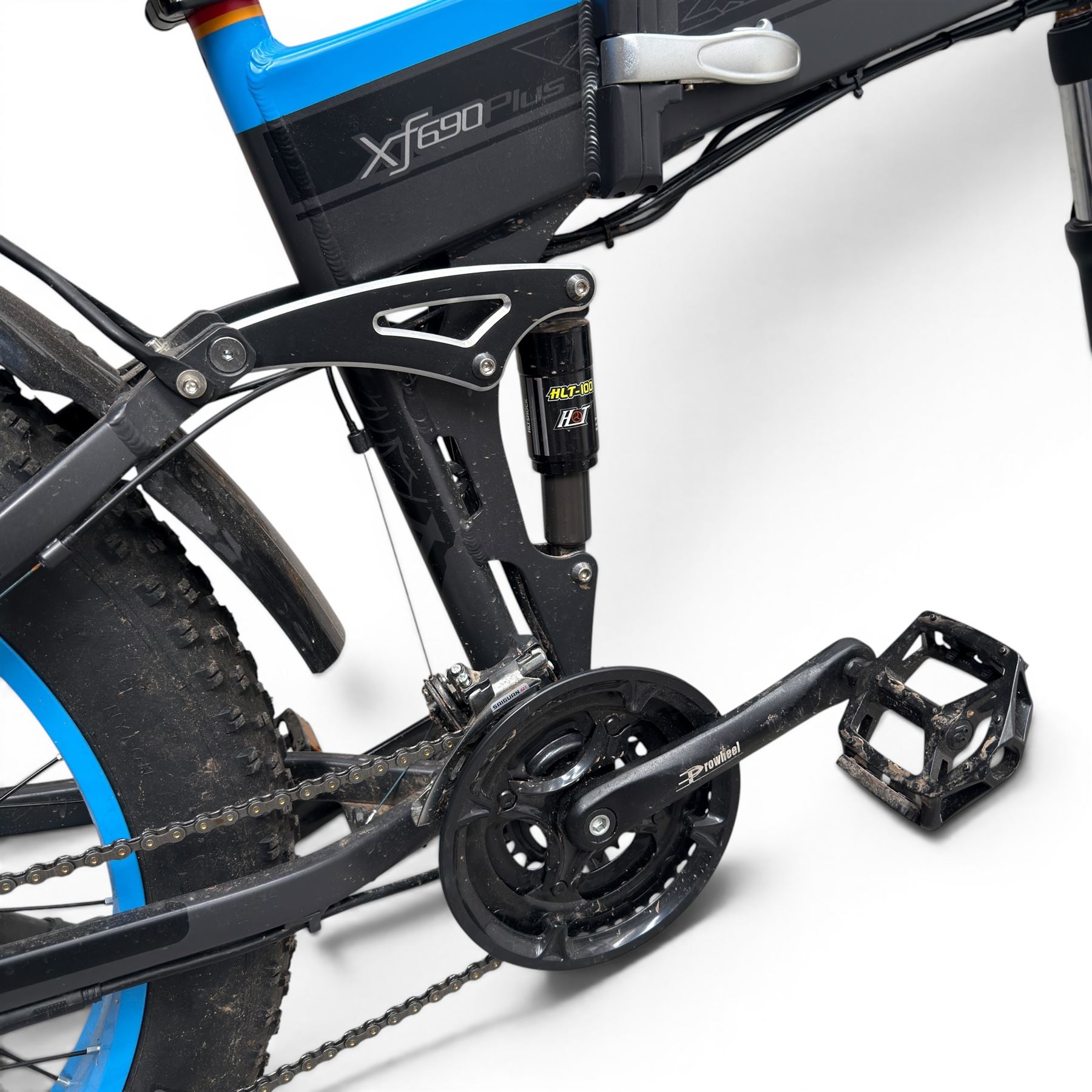 Cyrusher XF690 Plus - electric fat tyre bicycle, 250W model, with suspension forks, disc brakes, rear pannier bag and blue and black finish.