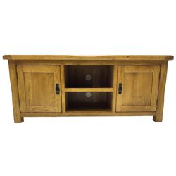 Contemporary medium oak TV or media unit, fitted with two panelled cupboards flanking two open shelves, on square feet