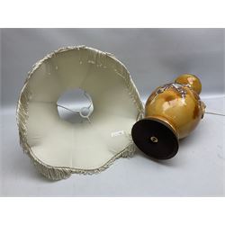 20th century Japanese vase converted to a lamp, the baluster form body decorated with samurai warriors and blossoming branches with twin handles, with wood base and fixtures, with tasselled fabric shade, H56cm excl shade