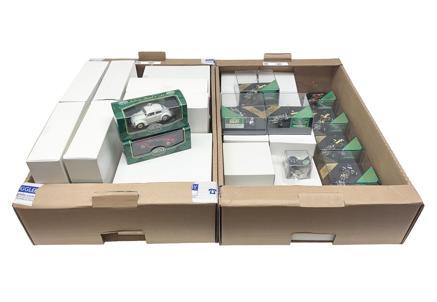 Heritage - thirty-five die-cast model racing cars comprising twenty-five Heritage Formula 1 1:43 scale models including Ferrari, Lotus, Yamaha etc; and ten Special Edition models including Williams Renault Ayrton Senna, David Coulthard and IndyCar, etc with certificates; and a Heritage Classics Damon Hill helmet; all in display boxes, many with original packaging (36)