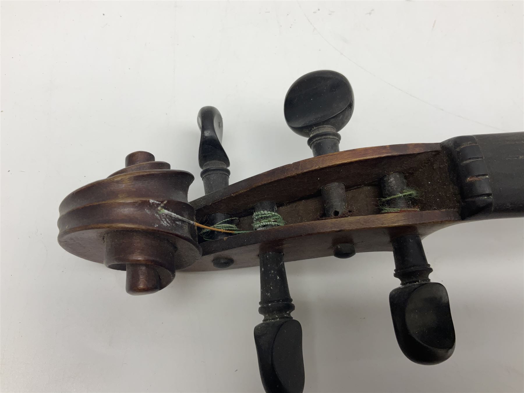 Chinese Parrot violin with 35.5cm two-piece back; L59.5cm in carrying case; and early 20th century German violin for restoration; bears label 'Antonius Stradivarius Faciebat Anno 1730'; cased with bow (2)