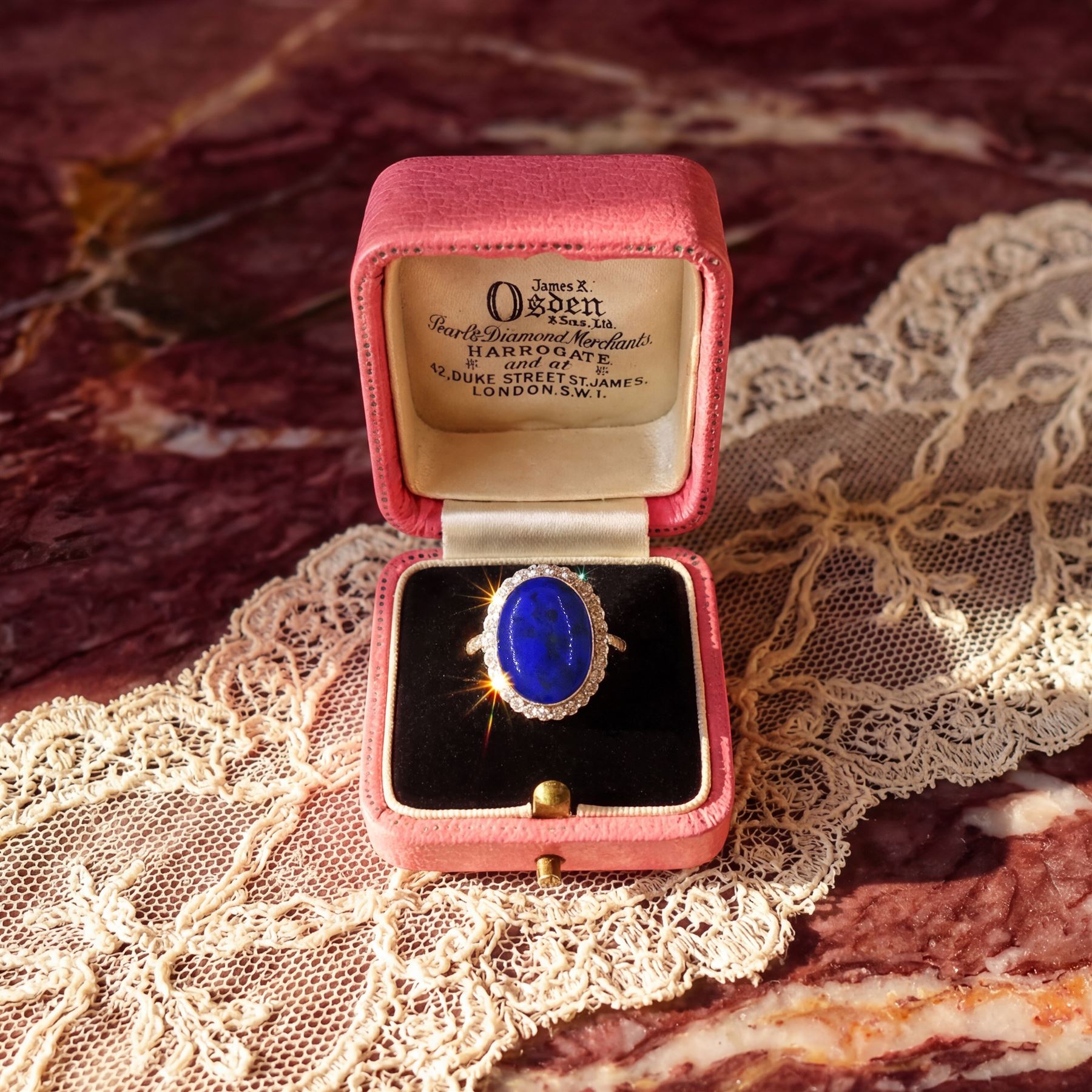 Early - mid 20th century 18ct gold and platinum lapis lazuli and diamond cluster ring, oval cut lapis lazuli surrounded by milgrain set rose cut diamonds, with diamond set shoulders